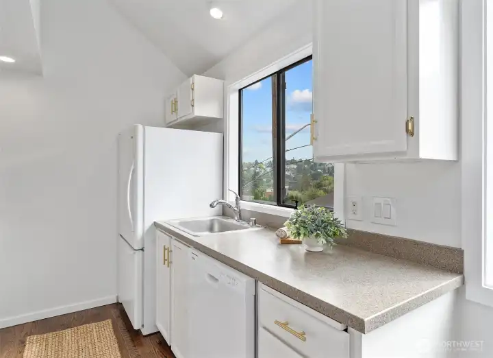 The kitchen has been updated along with new range and dishwasher installed in August 2025.