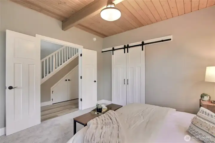 Grand French double door entrance into the primary suite.