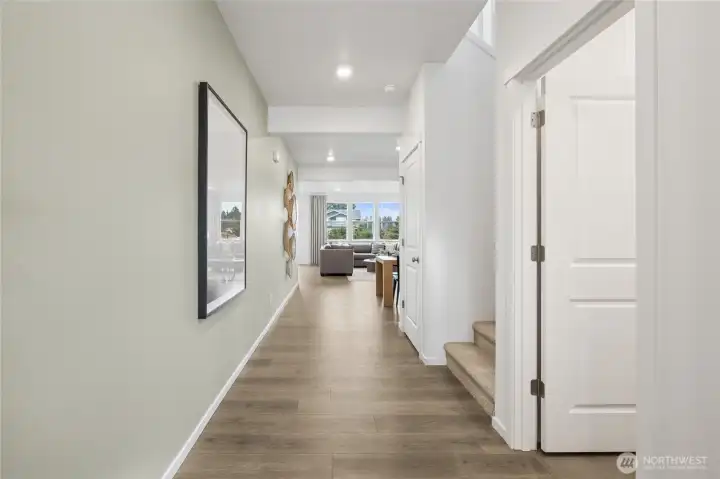 Wide hallway leading you to the rest of your beautiful home.   Pictures are for representational purposes only, colors and features may vary.
