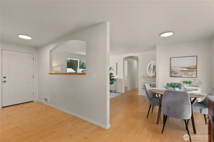 Comfortably transition from kitchen to dining area to living room.