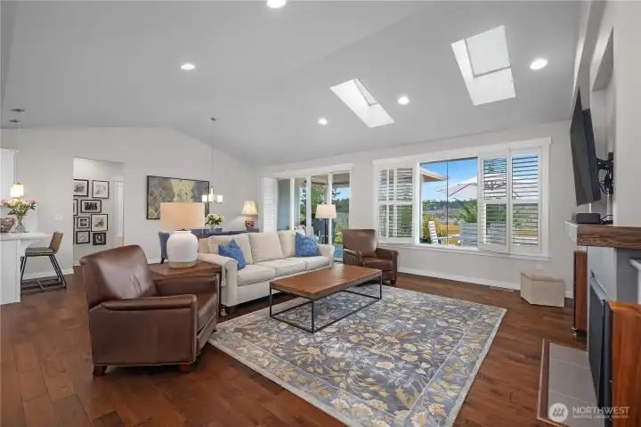 The vaulted Great Room opens to the dining area, kitchen and patio for ease of entertaining.