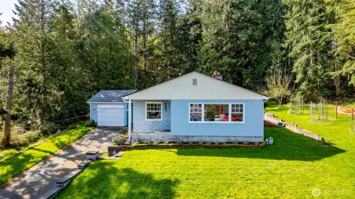 Welcome to 2601 17th St in gorgeous Anacortes! This classic mid-century home sits back on the lot for wonderful privacy and partial water views.
