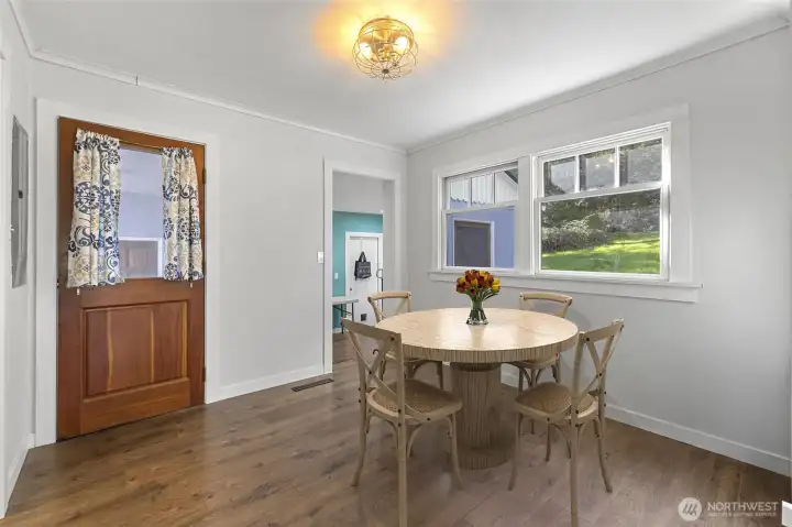 Virtual staged. 2nd entry door. Dining area or flex space off the kitchen and laundry