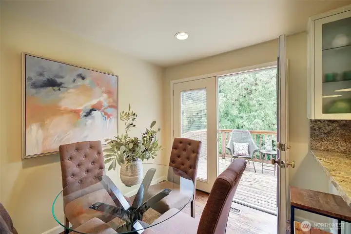 Dining area off kitchen with French doors to deck