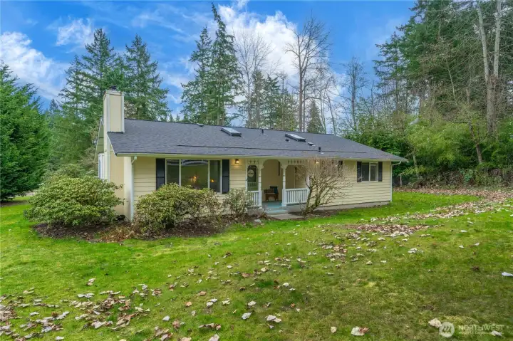 Charming rambler nestled on 1.23 private acres