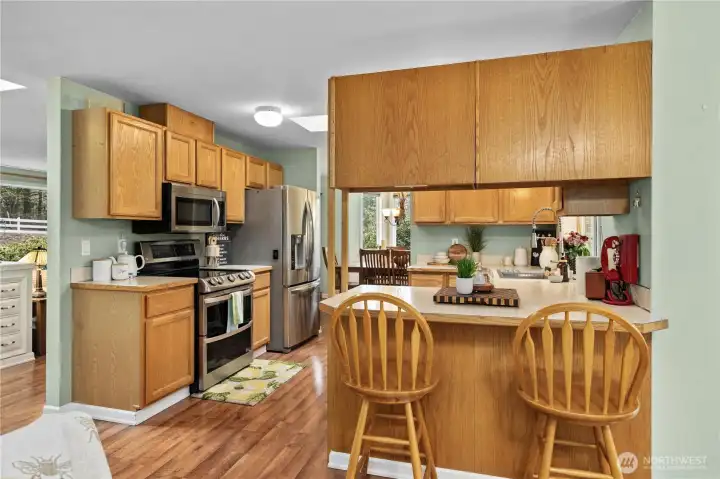 Efficient kitchen with convenient bar seating