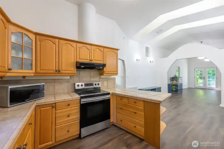 The kitchen connects to the dinning room with a view into the living room. The kitchen connects to the dinning room with a view into the living room.