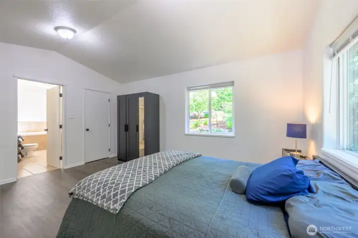 Primary bedroom has its own private door to the porch outside. It sits adjacent to the main living room. Primary bedroom has its own private door to the porch outside. It sits adjacent to the main living room.