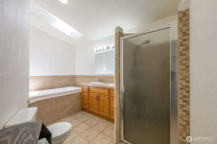 Primary bedroom bathroom. Double vanity, tub, standup shower. Primary bedroom bathroom. Double vanity, tub, standup shower.