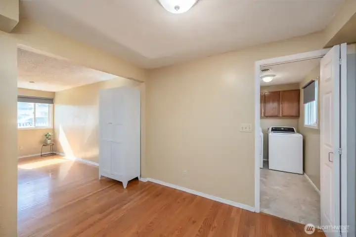 Entrance to the laundry room, garage access, and back door.