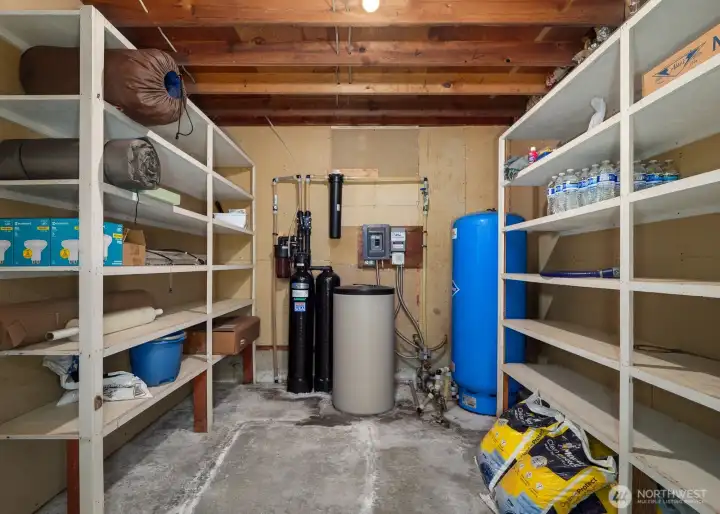 Pump Room & additional storage in Detached 3 car Garage. Additional W&D hookup located adjacent to this space