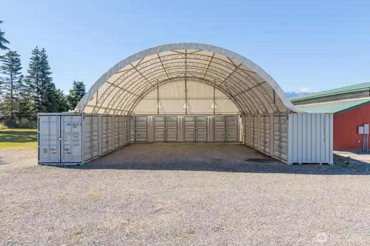 Covered hay (or ?) storage with Conex secured dry storage boxes