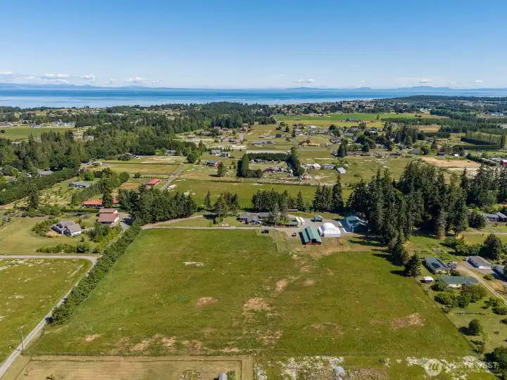View of both South and North pastures with Ranch home and buildings in center