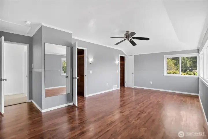 Primary bedroom on southeast side of home Primary bedroom on southeast side of home