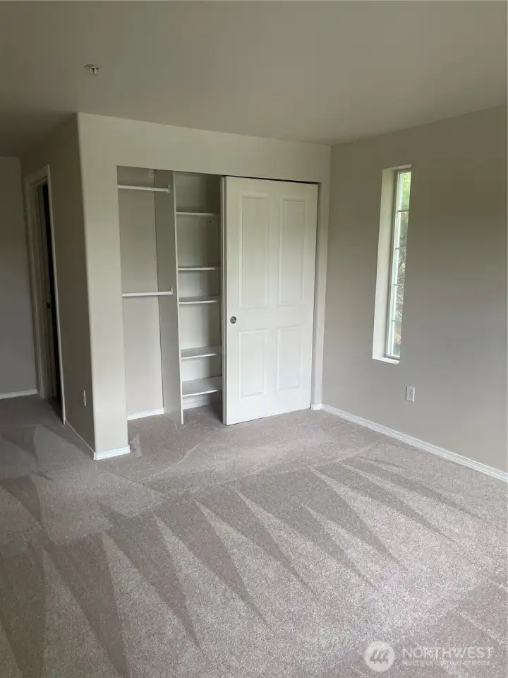 Primary bedroom. Built in closet shelves. Primary bedroom. Built in closet shelves.