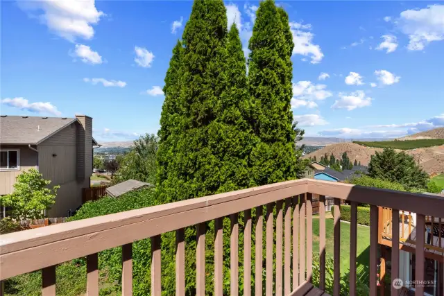 Here is view off your primary bedroom deck looking over the Wenatchee valley
