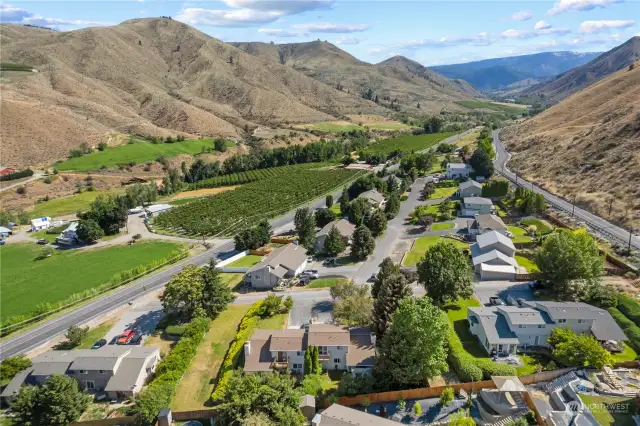 Check out this great setting of orchards vinyards and mountains when you live here