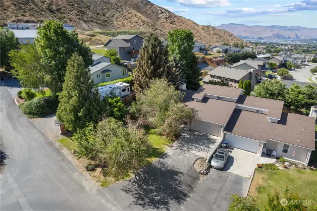 View from the sky of your next home on big private lot