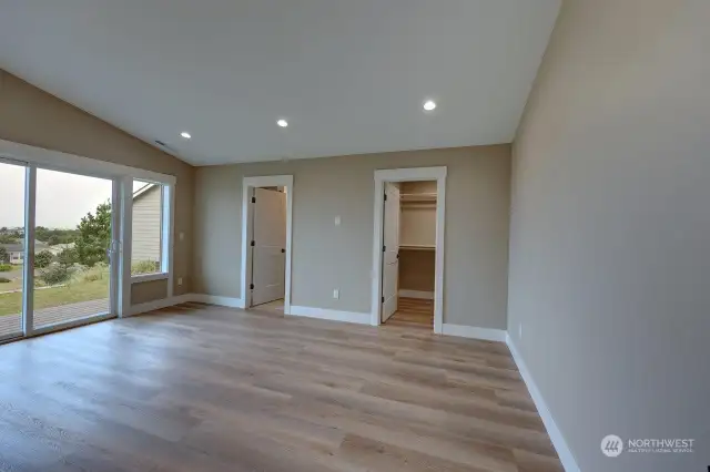 Primary Bedroom (r) bath (l) walk in closet