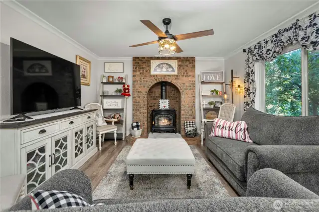 A closer view showing the lovely propane stove.  Perfect for staying cozy while watching the snow fall in the winter time and decorative during the warm summer months.