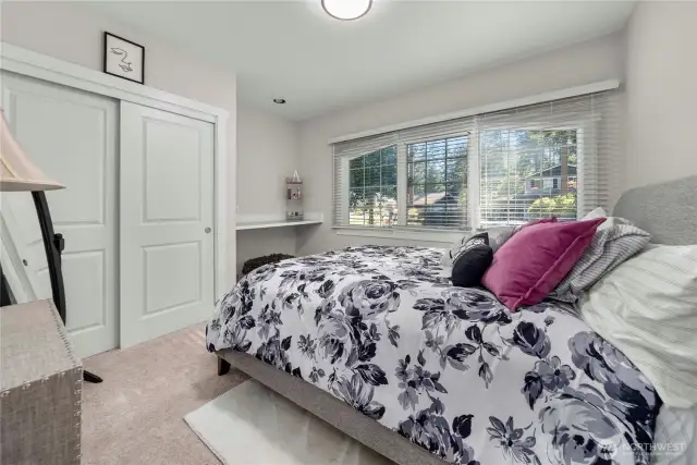 One of two large main-floor bedrooms, everything in the house is perfect and new.
