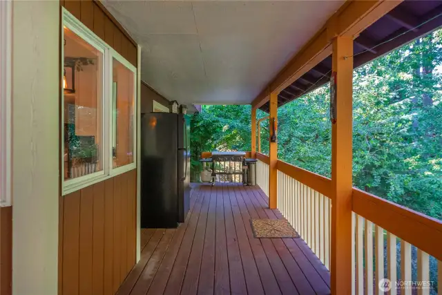 Let's talk amazing outdoor living space.  You will spend hours just enjoying the wildlife and birds comfortably relaxing on your full-length covered back deck.  Perfect to BBQ all year long.  Sheltered in the winter and nice and shady in the summer.