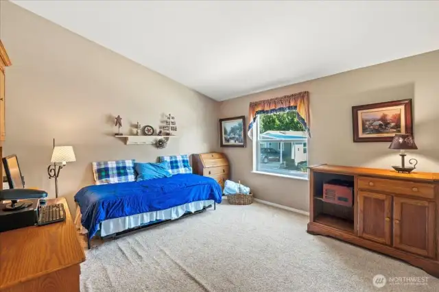 Second bedroom has two closets and vaulted ceilings.