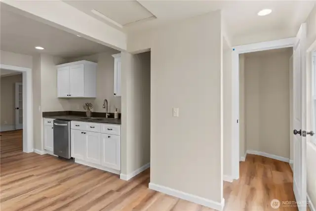 Stackable washer and dryer around the kitchen corner