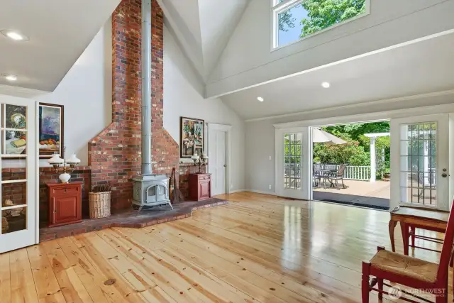 Vaulted living room with refinished southern pine floors