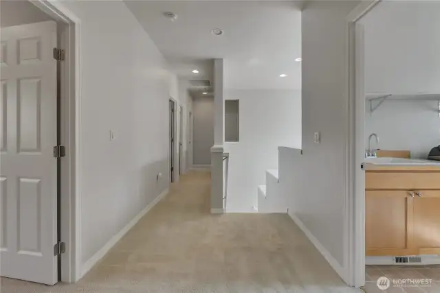 Upstairs, multipurpose room to left, laundry right