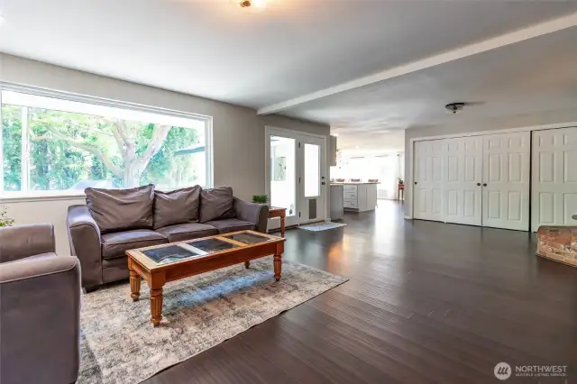 Living room area, large bank of closets for storage