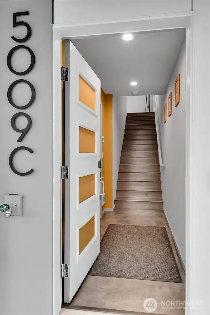 One car garage and office/flex space through door on the left