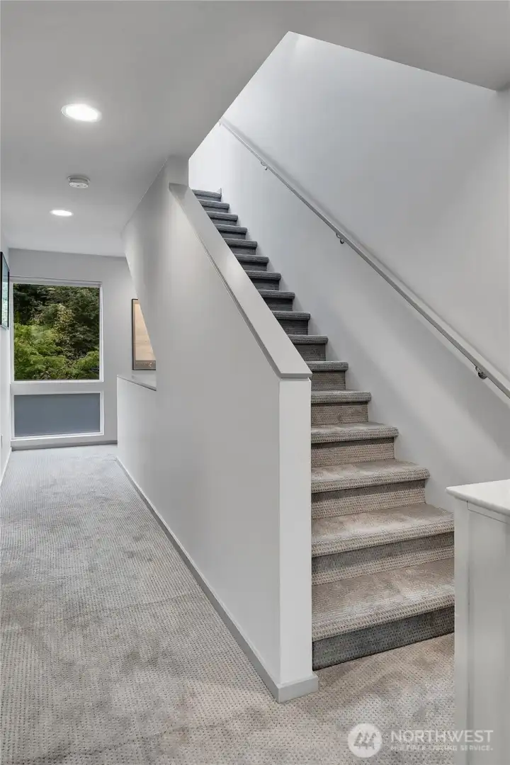 Stairs to large rooftop deck!