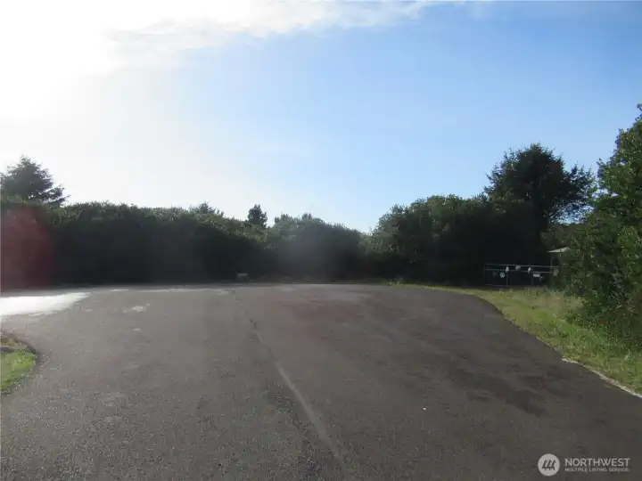 NORTH OF THE PROPERTY IS OCEAN SHORES BLVD TO DOWN TOWN SHOPPING OR JUST AROUND THE CORNER IS A COMMUNITY CLUB PARK AND POOL OR DRIVE TO BUTTERCLAM FOR ACCESS TO PACIFIC BEACHES.