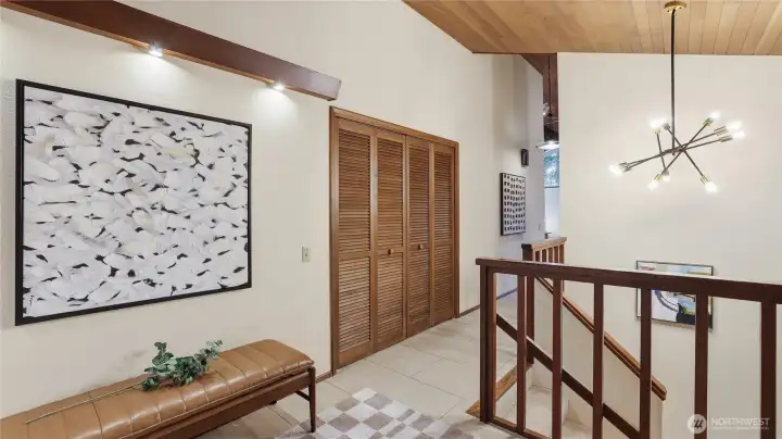 Stairway by entrance leads to all Bedrooms & Baths at daylight basement.