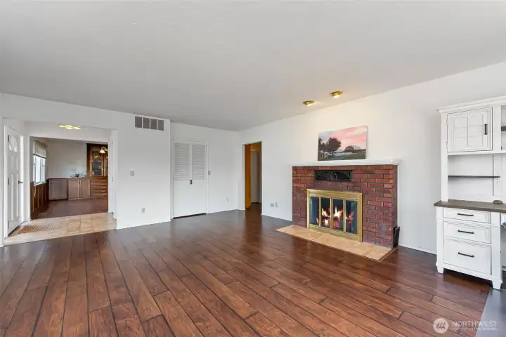 Living room with entrance to the dining room.