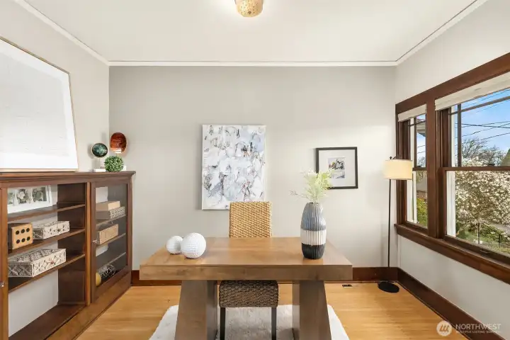 Spacious den-office with great light from south-facing windows and built-in shelves