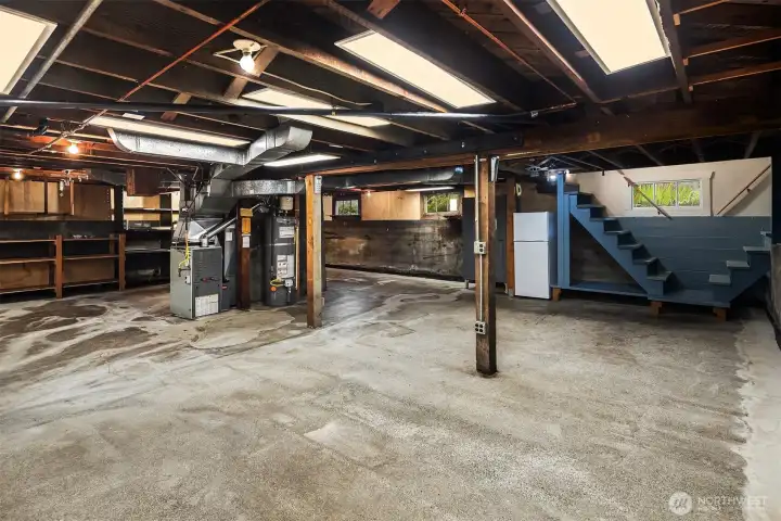 Lower level with tall ceilings await your imagination