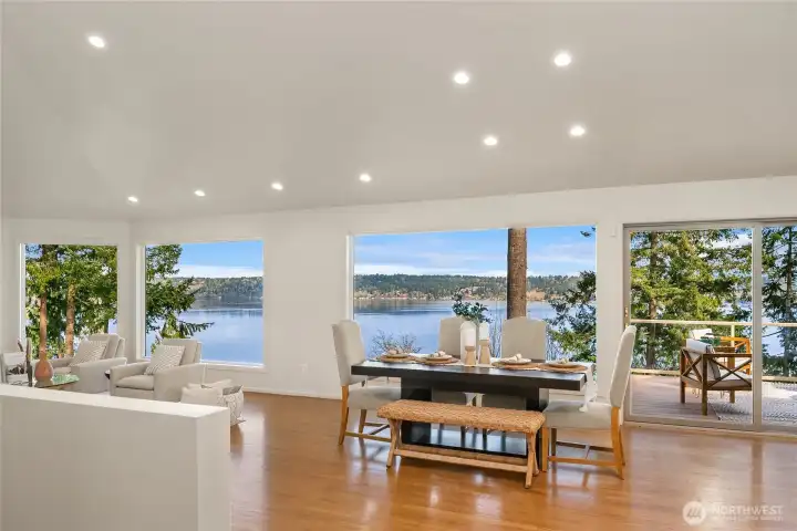 Open great room concept provides 180° views and showcases beautiful hardwood floors.