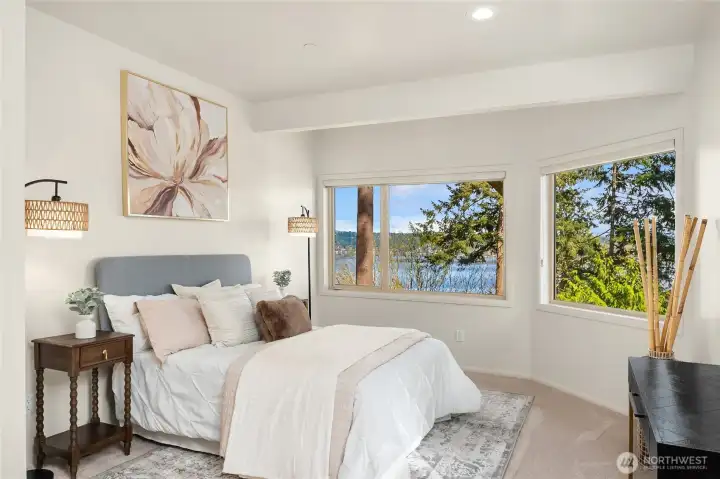 Second bedroom easily fits a king size bed and still has a seating area and great closet space!