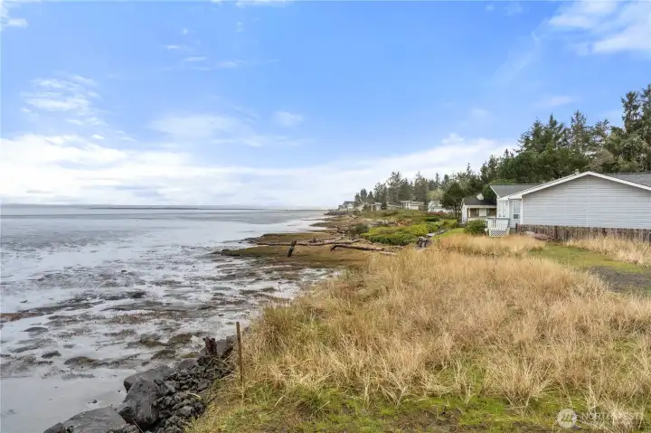 Gently sloping lower area leads to a beautiful beach setting.