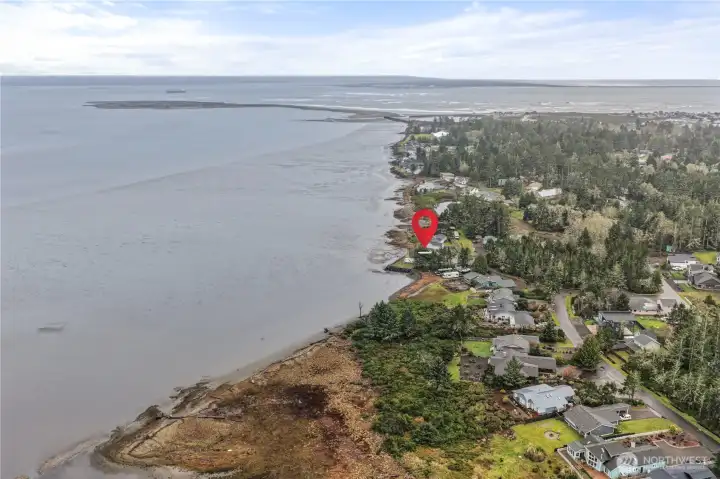 A rare opportunity to own improved bayfront land.