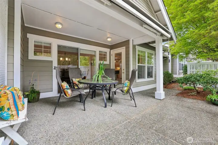 Covered rear patio is extended for planting pots!