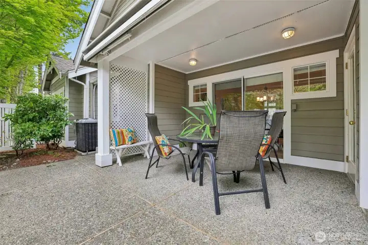 Covered rear patio with electric awning