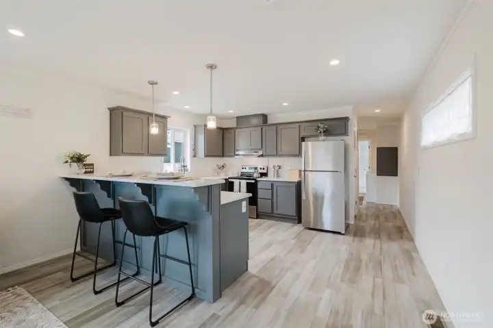 What a great kitchen and breakfast bar too!