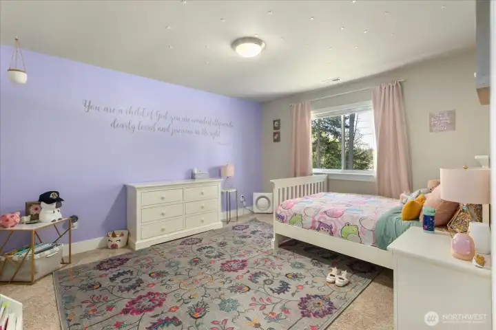 Charming bedroom with designer accents and a warm, inviting feel.