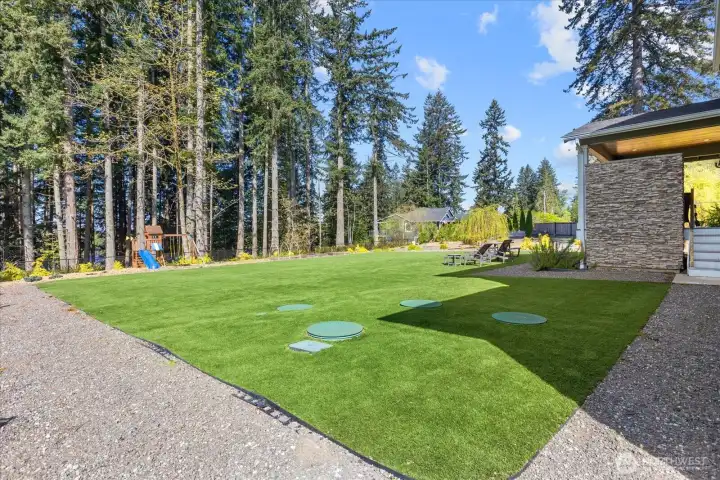 Expansive, low-maintenance yard with plenty of room to play, gather, or simply enjoy the outdoors.