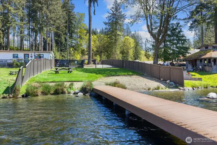 Dock access offering a peaceful setting to relax, launch a paddleboard, or take in the view.