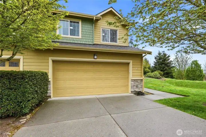 Premium end-unit townhome in Lynnwood with a rare two-car side-by-side garage near Alderwood Mall.