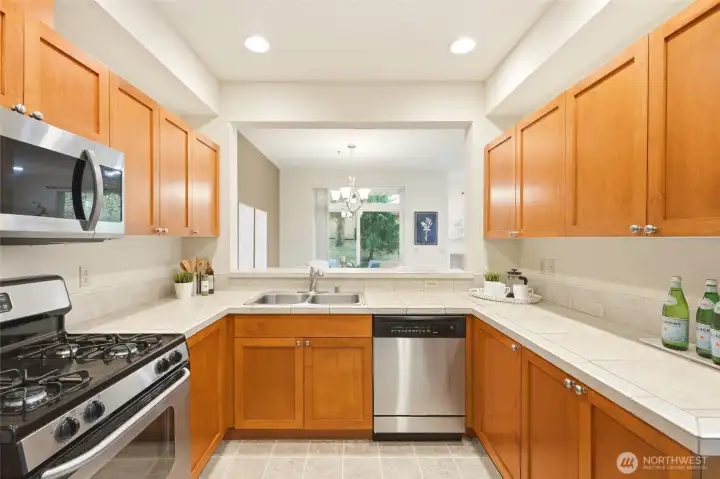 Open kitchen layout overlooking the dining area, perfect for entertaining and modern living.